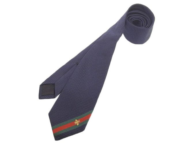 Cravatta stretta in seta Gucci blu navy con ape