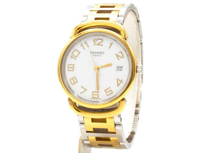 Montre Pullman Hermès. Doré 