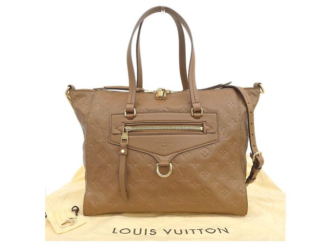 Bolsa Tote Lumineuse PM Monogram Empreinte Louis Vuitton M94323 Marrom