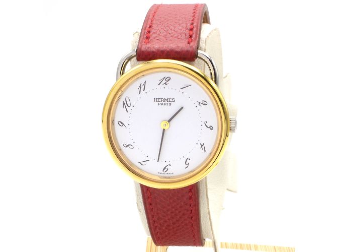 Relógio Hermès Arceau de aço e banhado a ouro com pulseira de couro vermelho Dourado