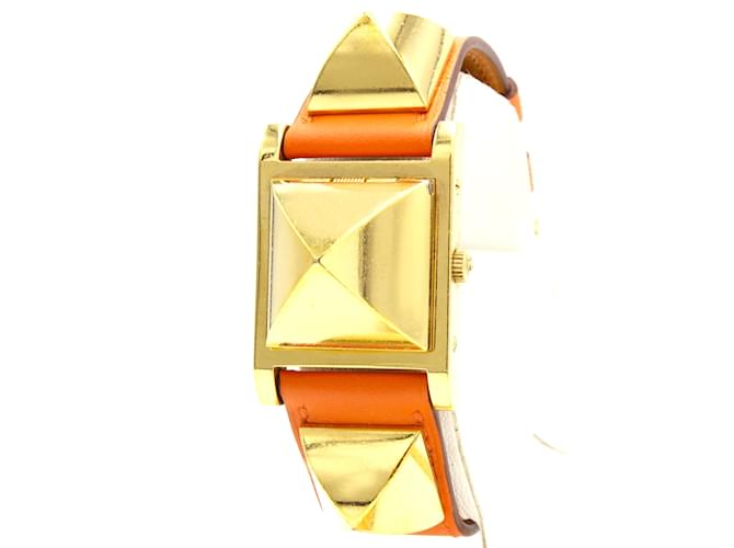 Hermès Superbe montre pour femmes Hermes Médor plaquée or. Doré 