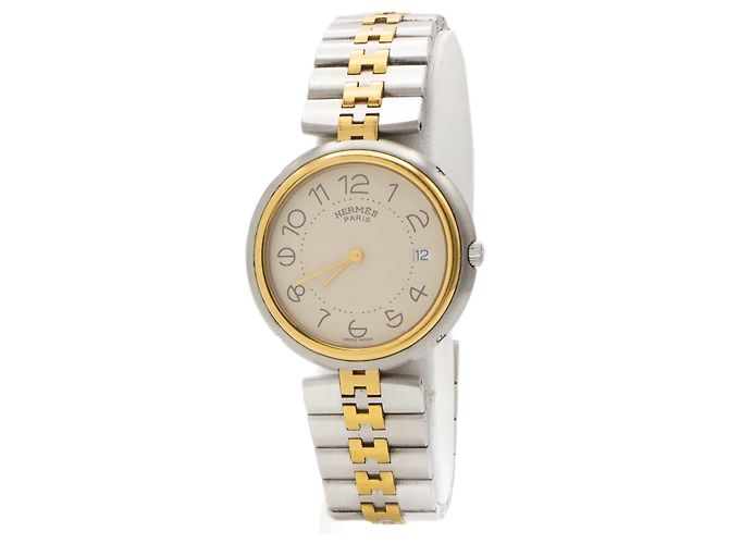 Relógio de aço Hermès em muito bom estado, modelo "Profile". Dourado