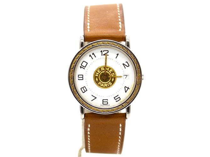 Relógio Sellier da Hermès. Dourado