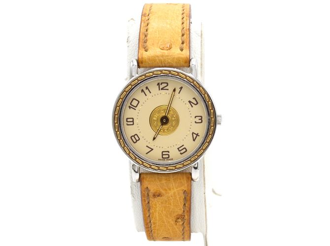 Relógio Sellier da Hermès. Dourado