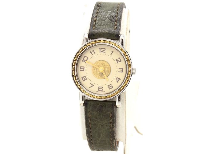 Reloj Hermès Sellier. Dorado 