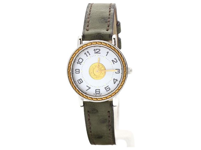 Hermès Reloj Hermes Sellier. Dorado