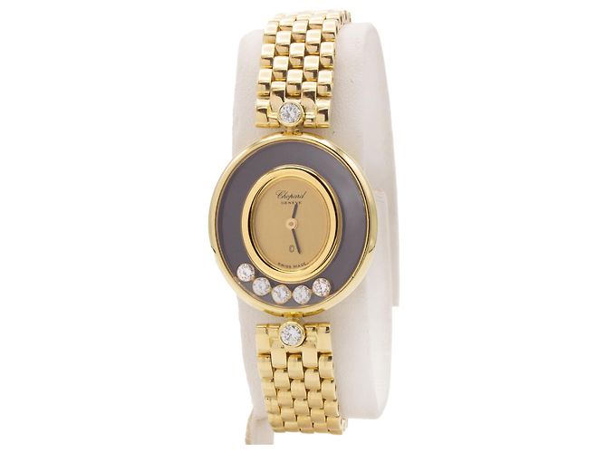 Montre Chopard, collection Happy Diamonds. Doré
