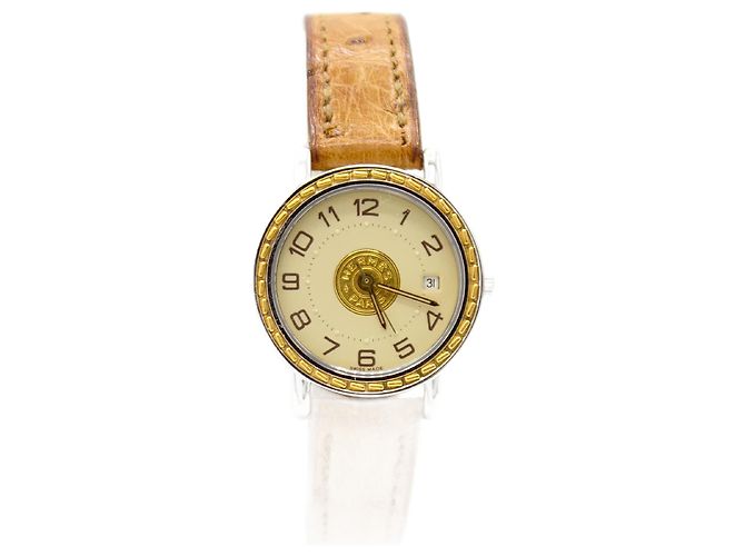 Relógio Sellier da Hermès. Dourado
