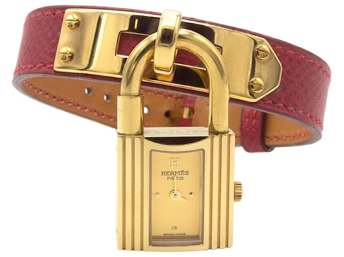 Orologio Hermès Kelly placcato oro con cinturino in pelle rossa D'oro 