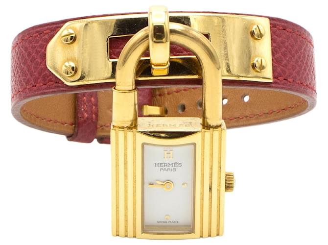 Montre Hermès Kelly plaquée or avec bracelet en cuir rouge Doré 