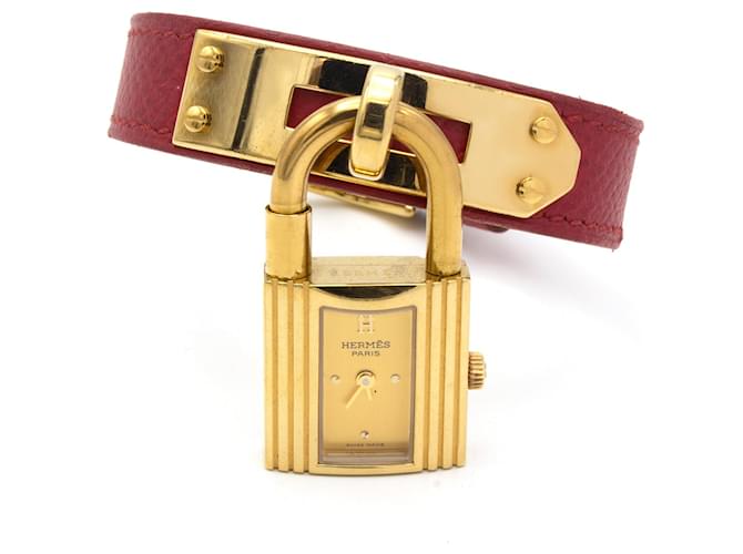 Montre Hermès Kelly plaquée or avec bracelet en cuir rouge Doré 