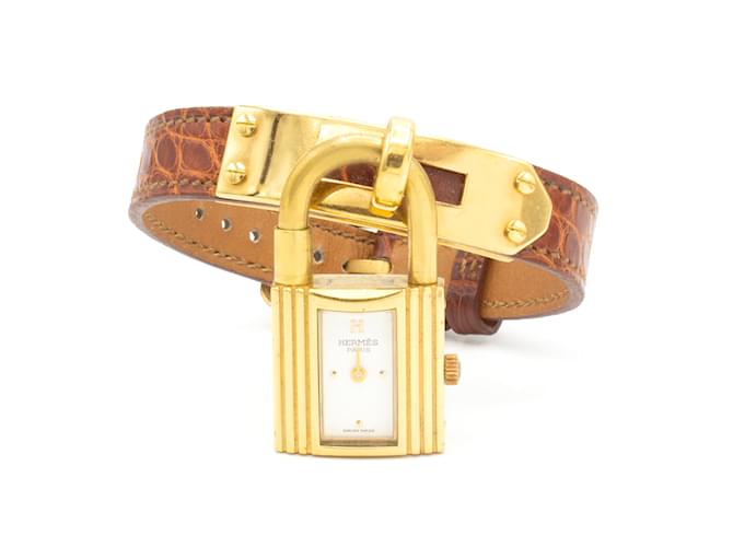 Hermès Montre Hermes Kelly entièrement révisée, livrée avec une garantie d'un an du vendeur à partir de la date d'achat Doré 