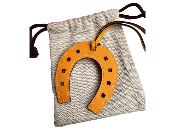 Bijou de sac Hermès Paddock Orange en cuir 