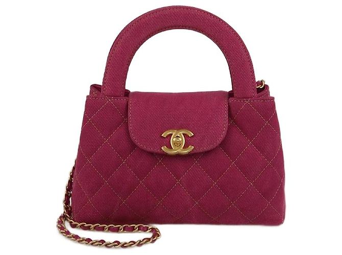 Bolso de compras Mini Kelly de denim acolchado fucsia de Chanel