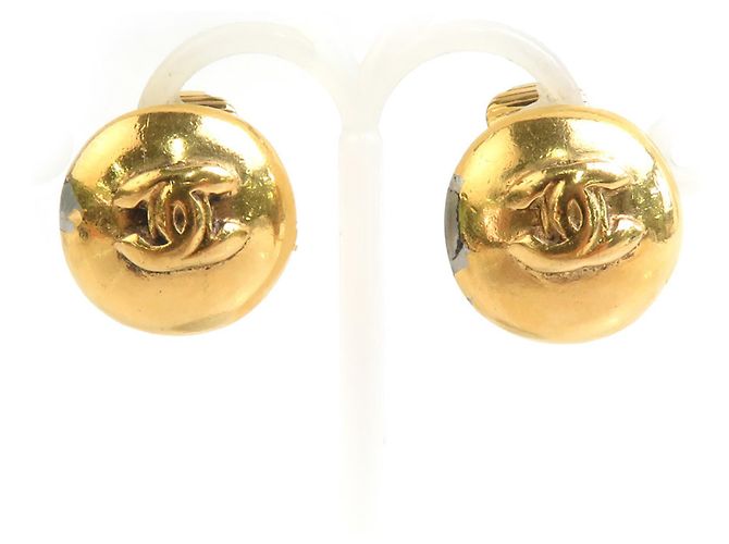 Pendientes de clip de metal dorado Chanel Coco Mark
