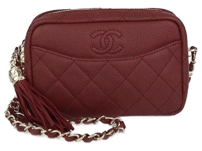 Camera Sac à caméra mini Coco en caviar matelassé avec pompon de Chanel