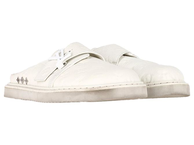Mules LV Easy em couro branco da Louis Vuitton Cru