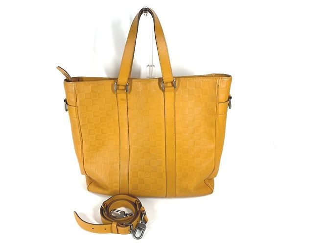 Bolsa Tadao Damier Infini Louis Vuitton Amarelo