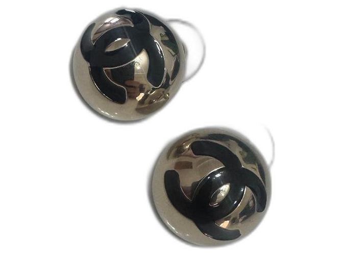 Orecchini Chanel in metallo nero e oro D'oro 