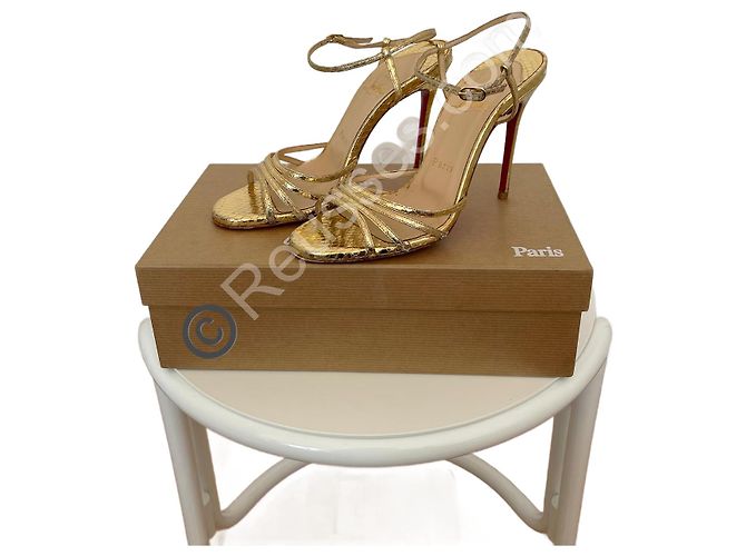 Sandali con tacco Christian Louboutin in serpente Ayers