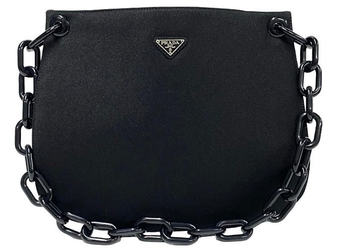Bolso semi cruzado de lona con logo triangular de Prada y cadena de plástico Negro