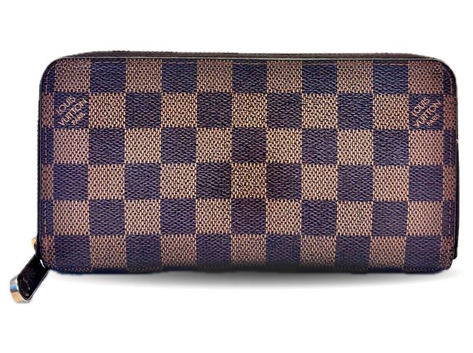 Cartera Zippy Damier Ebene Louis Vuitton Castaño