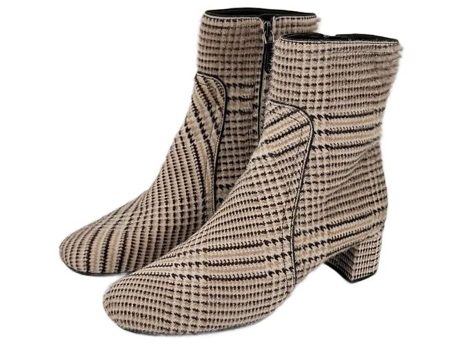 Botines Prada de pelo de pony beige