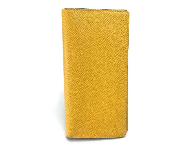 Cartera Larga Brazza en Taiga Louis Vuitton Amarillo