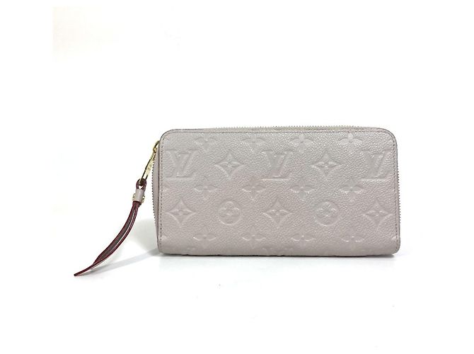 Carteira Zippy Monogram Empreinte Louis Vuitton Marrom