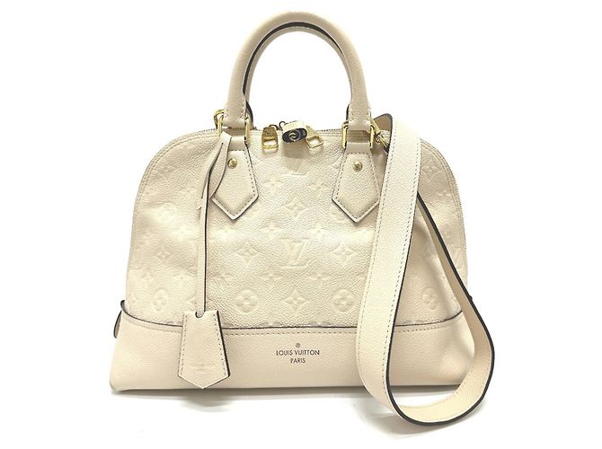 Bolsa de mão Neo Alma PM em Monogram Empreinte Louis Vuitton Bege