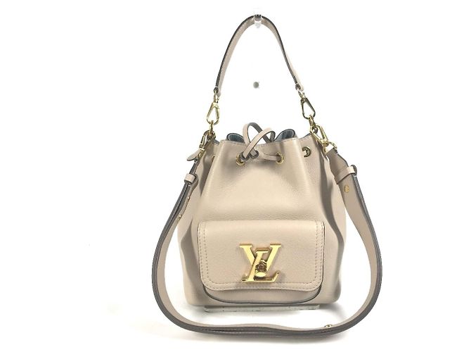 Bolsa Lockme Bucket NV da Louis Vuitton Bege Areia