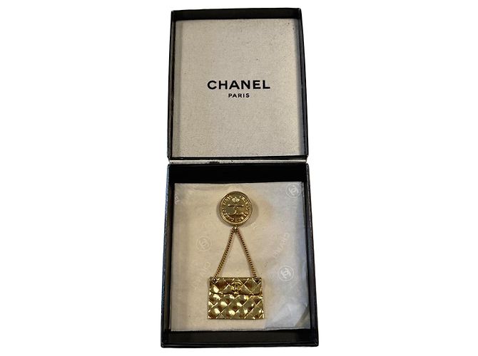 Spilla Chanel Logo CC Metallo Dorato D'oro