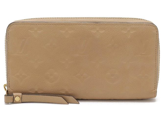 Carteira Zippy Monogram Empreinte Louis Vuitton Marrom Bege