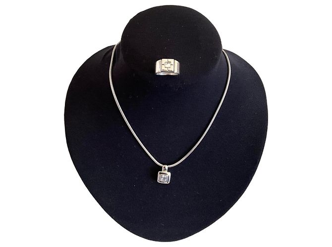 Conjunto de colgante y anillo Yves Saint Laurent plata