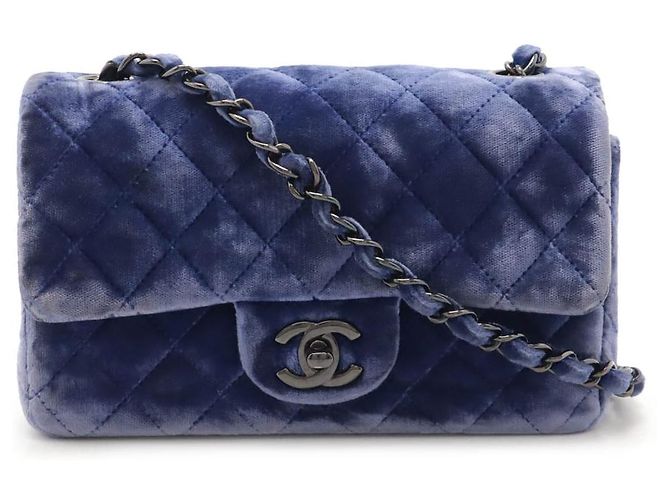 Bolsa de ombro mini matelassé de veludo da Chanel Azul
