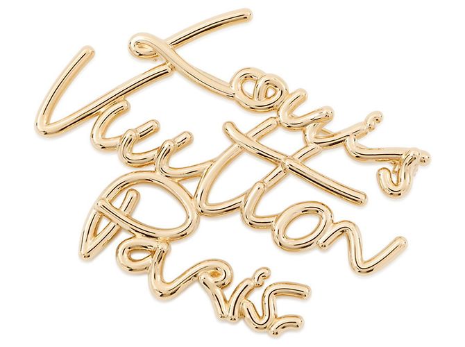 Spilla in metallo dorato Louis Vuitton D'oro