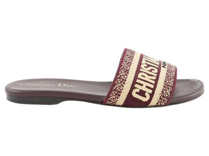 Dior Mules de cuero burdeos