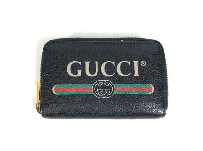 Monedero de cuero negro Gucci