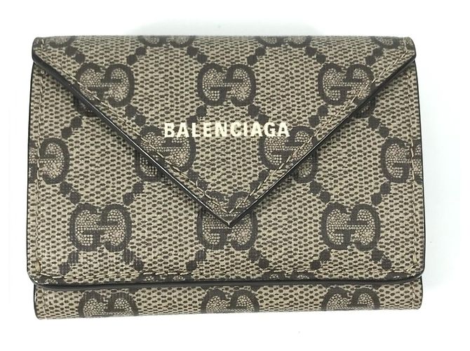 Gucci Tri-fold Wallet in GG Supreme Canvas