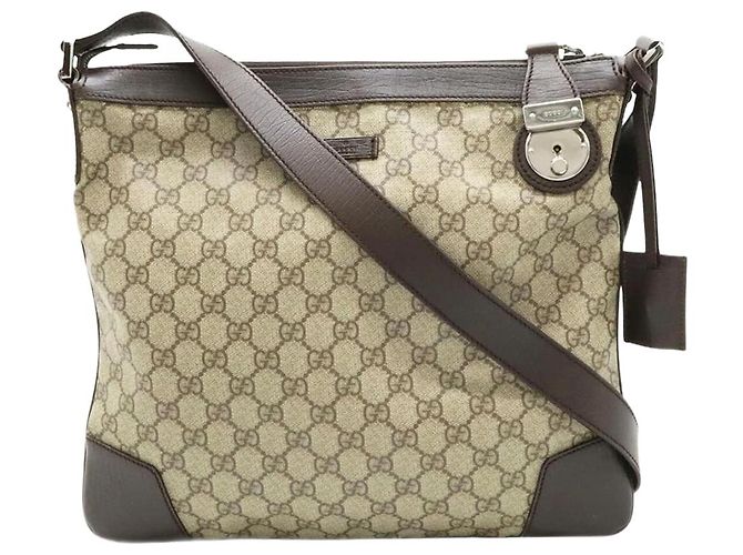 Gucci Bolsa de ombro em lona e couro GG Supreme marrom
