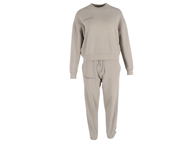 Autre Marque Conjunto de suéter y pantalones de chándal de algodón beige con estampado de logo Pangaia