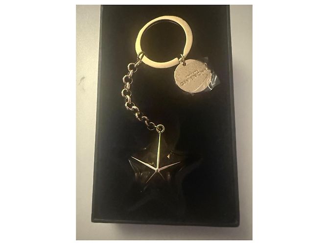 Chaveiro Estrela Givenchy Dourado Metal