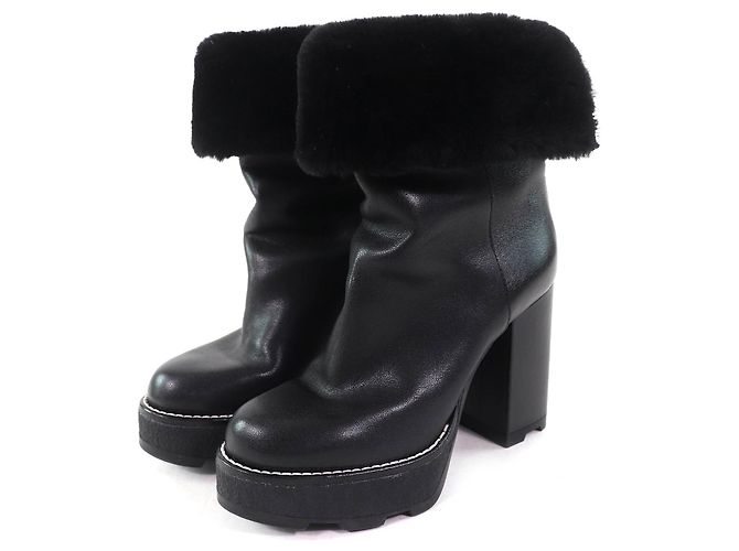 Botas de shearling metálicas com logo LV da Louis Vuitton Preto