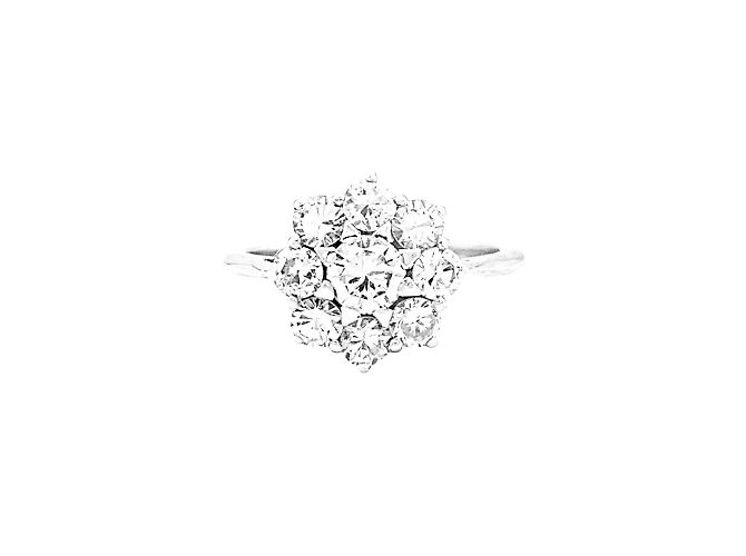 Autre Marque White gold and platinum flower ring set with diamonds.