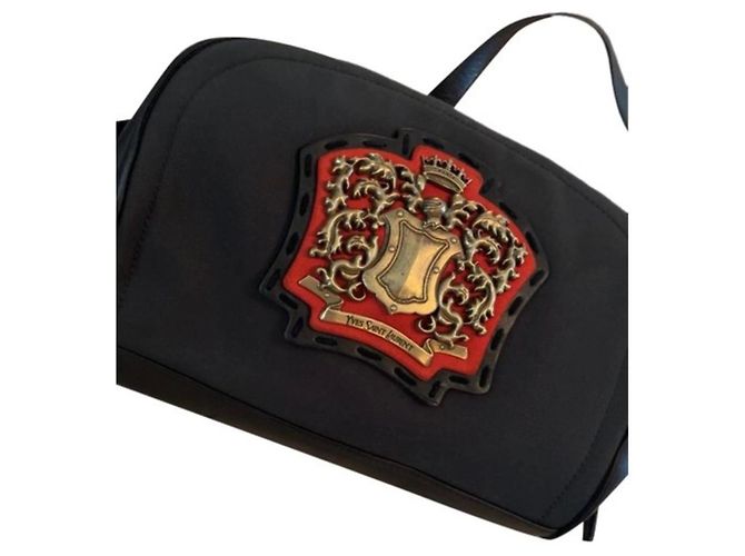 Bolsa Yves Saint Laurent de couro preto 