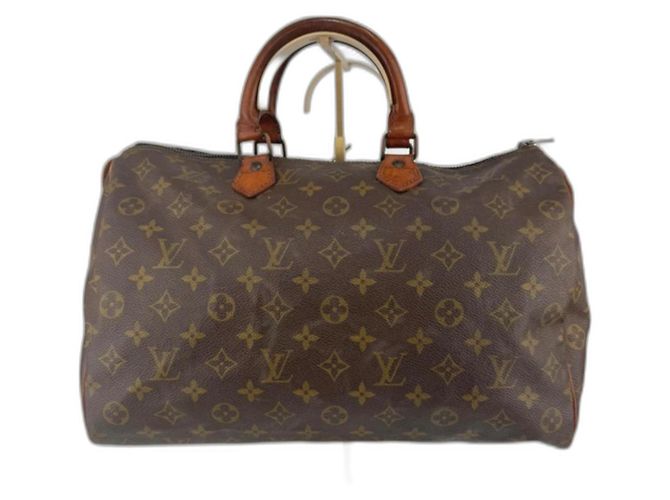 Bolsa de mão Louis Vuitton Speedy Monogram em couro marrom