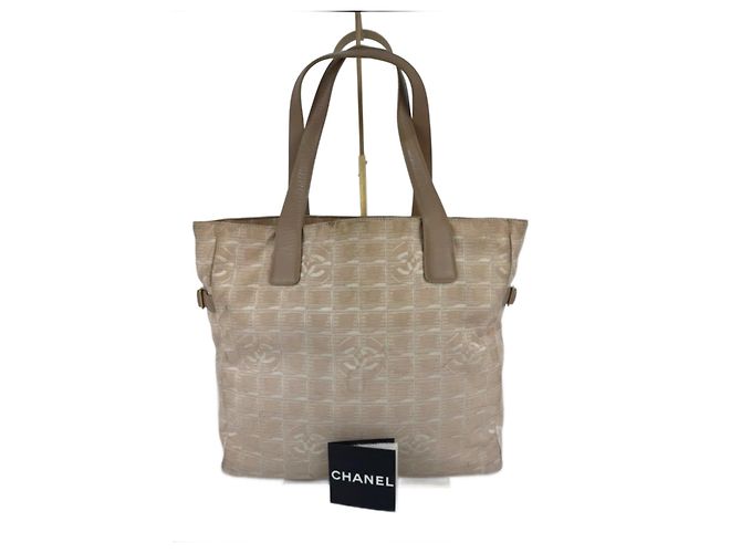 Bolsa de ombro Chanel em lona e couro 258 Bege