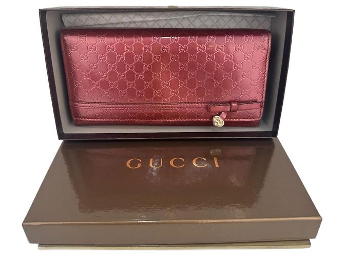 Cartera larga de cuero patentado Microguccissima rosa de Gucci
