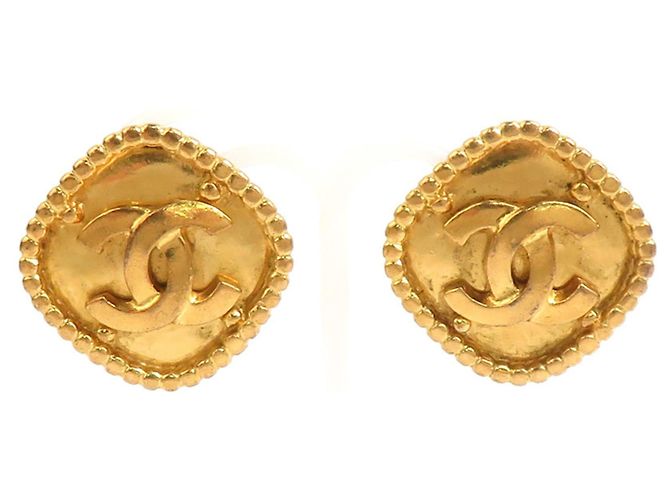 Orecchini a clip in metallo dorato Chanel Coco Mark D'oro