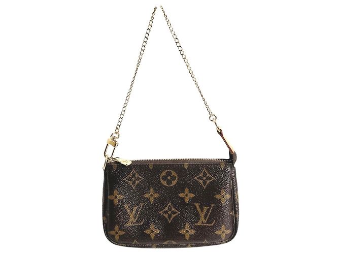 Louis Vuitton Monogram Mini Pochette Accessoires Handtasche Braun Monogramm